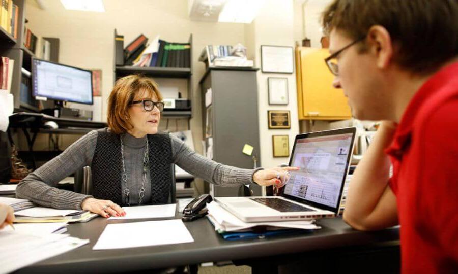 Student and professor in lab at University of Rochester 